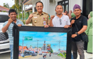 Lukisan Sudut Kota Karya Ketua PD IWO Tebo Dikoleksi Pj Bupati Tebo