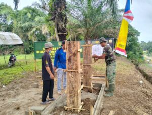 Satgas TMMD Ke-123 Kodim 0416/Bute Bangun Tugu Prasasti