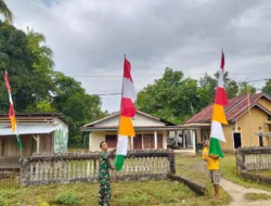 Sambut Bulan Kemerdekaan, Satgas TMMD dan Warga Tanjung Agung Kibarkan Merah Putih